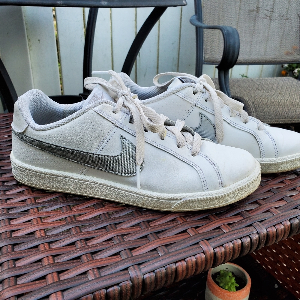 Nike white and silver shoes
